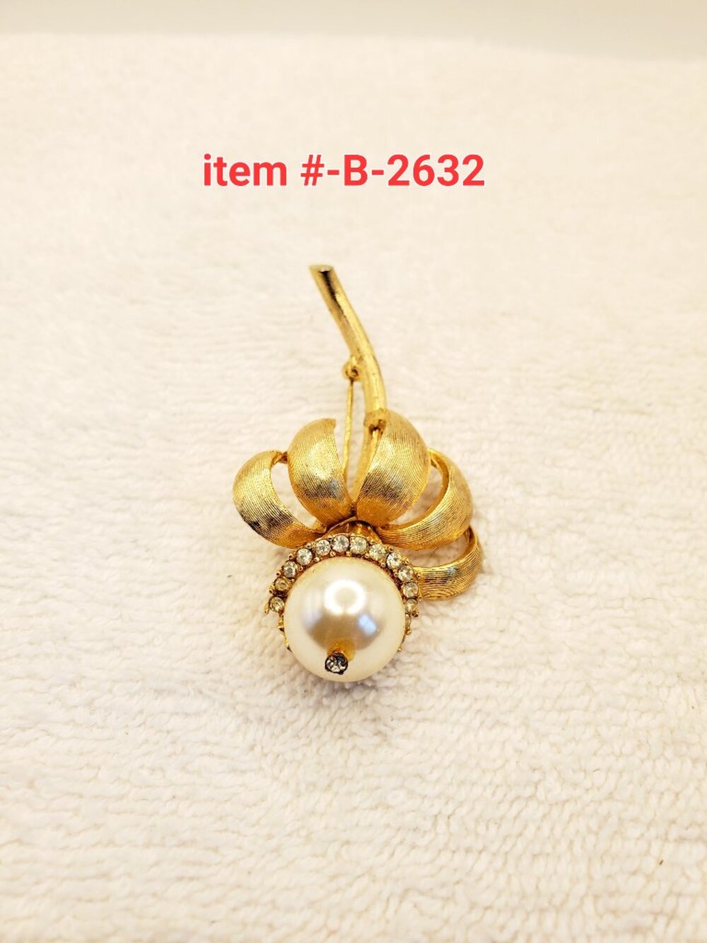1 Brooch, item # B-2632,.  wt. 19 grams.